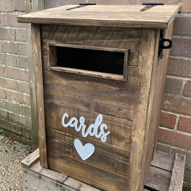 A small table top letterbox made from pallet wood