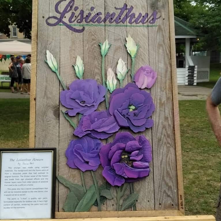 painted wooden flower design madefrom pallet wood